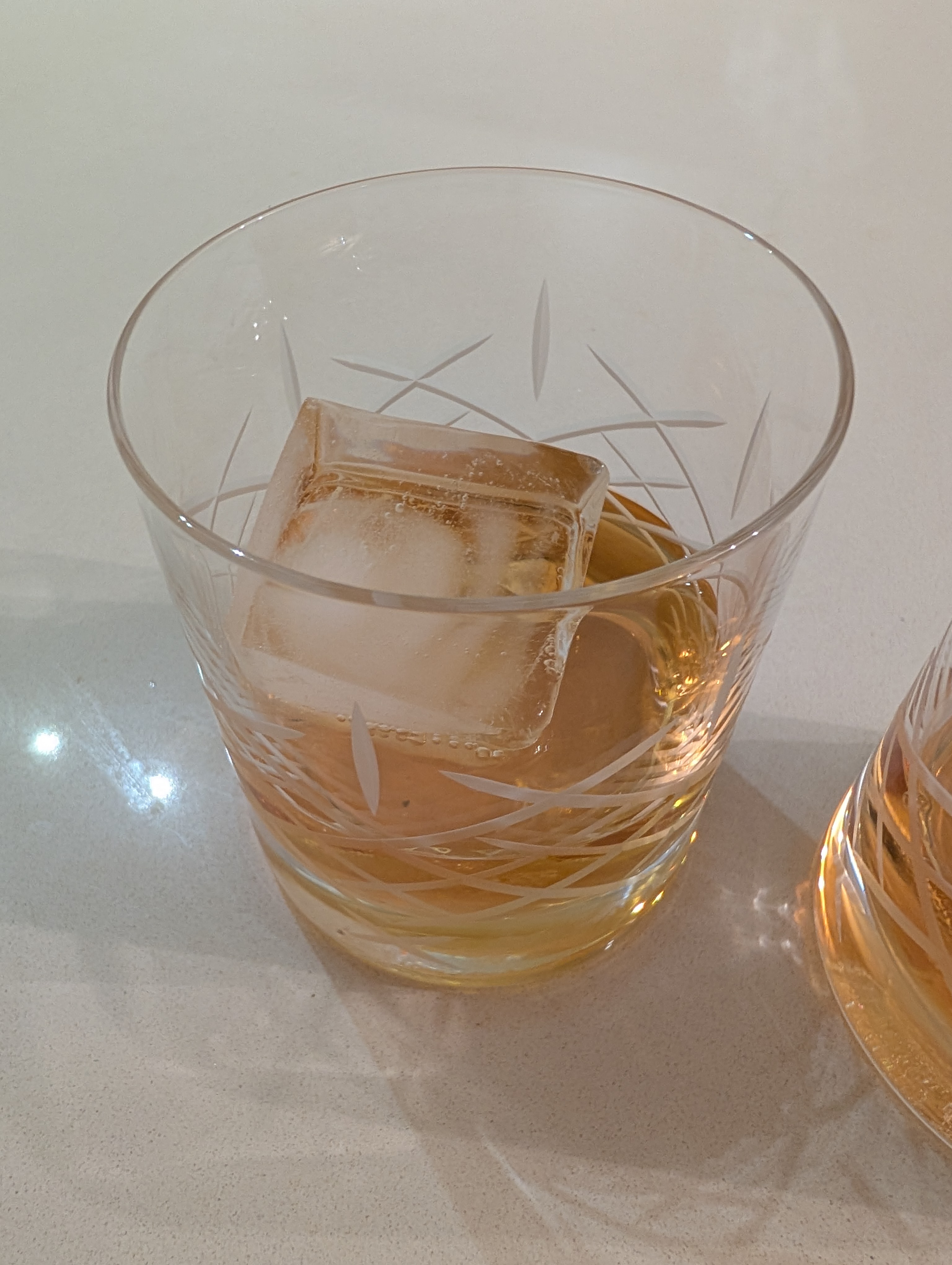 Photo of the whisky in a glass with ice