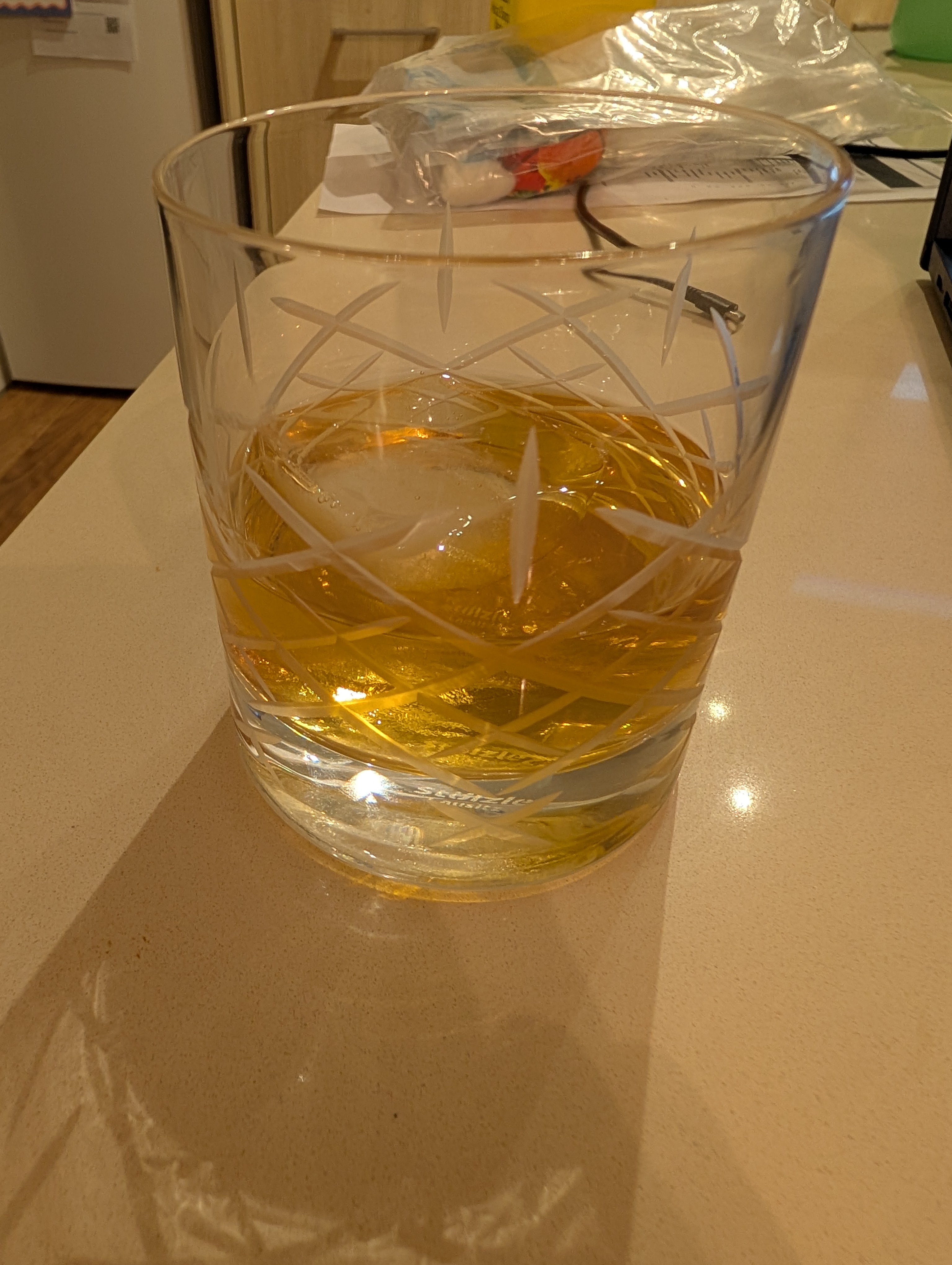 Photo of the gin in a glass with ice